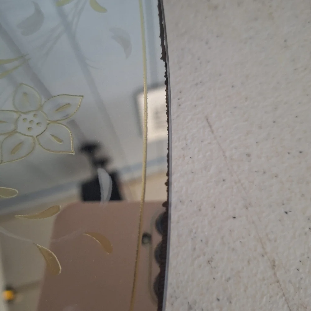 Round Decorative Wall Mirror with Floral Design